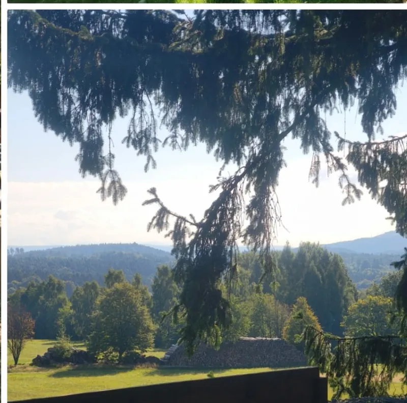 Blick über Wiesen und Wälder im Zittauer Gebirge